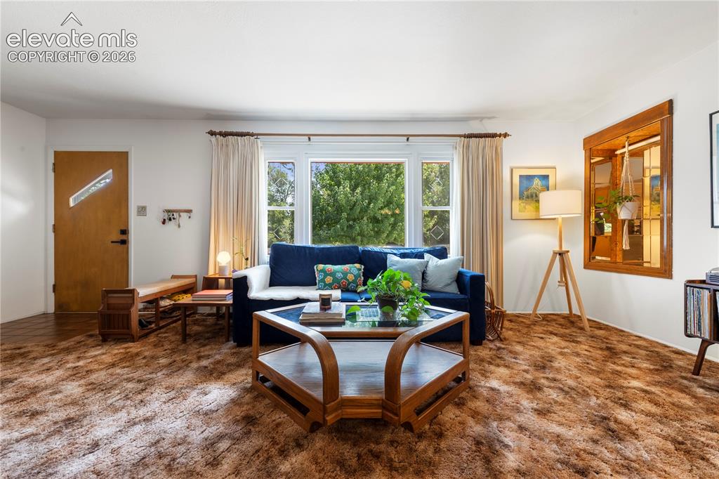 Image 6 of 49: Entry Living Room