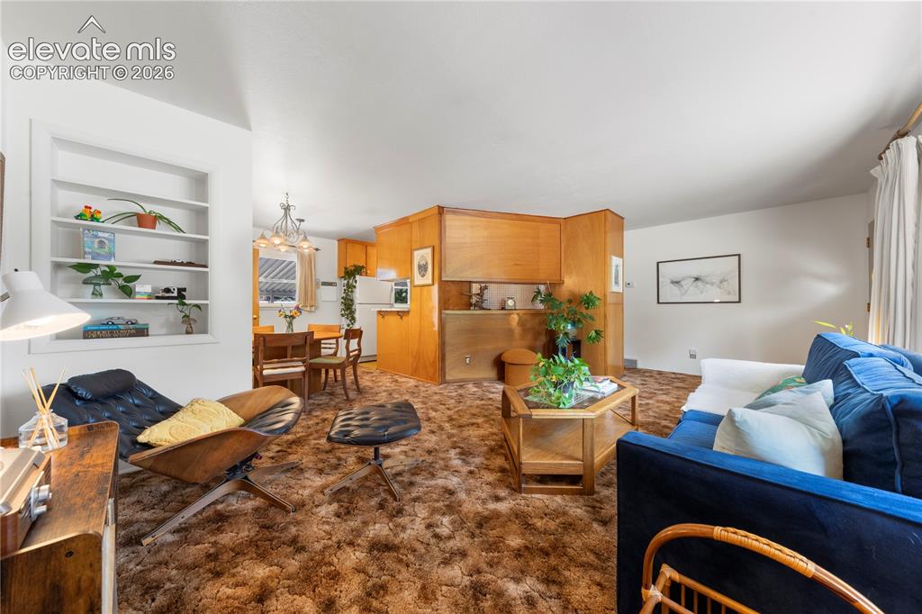 Image 9 of 49: Living Room Kitchen