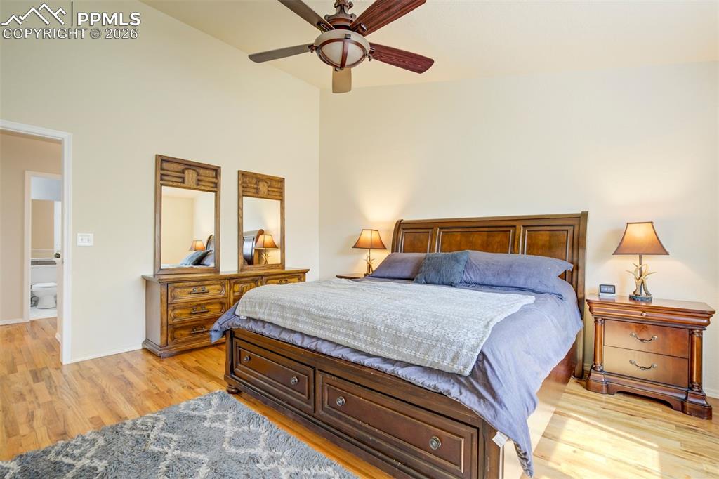 Image 23 of 50: Well-appointed primary suite with ample space for furnishings, complemented