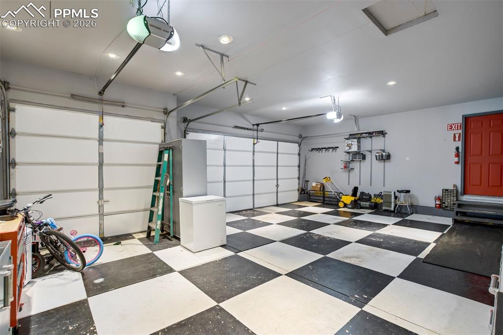 Image 42 of 50: Additional views highlight the garage’s generous size and functionality, co