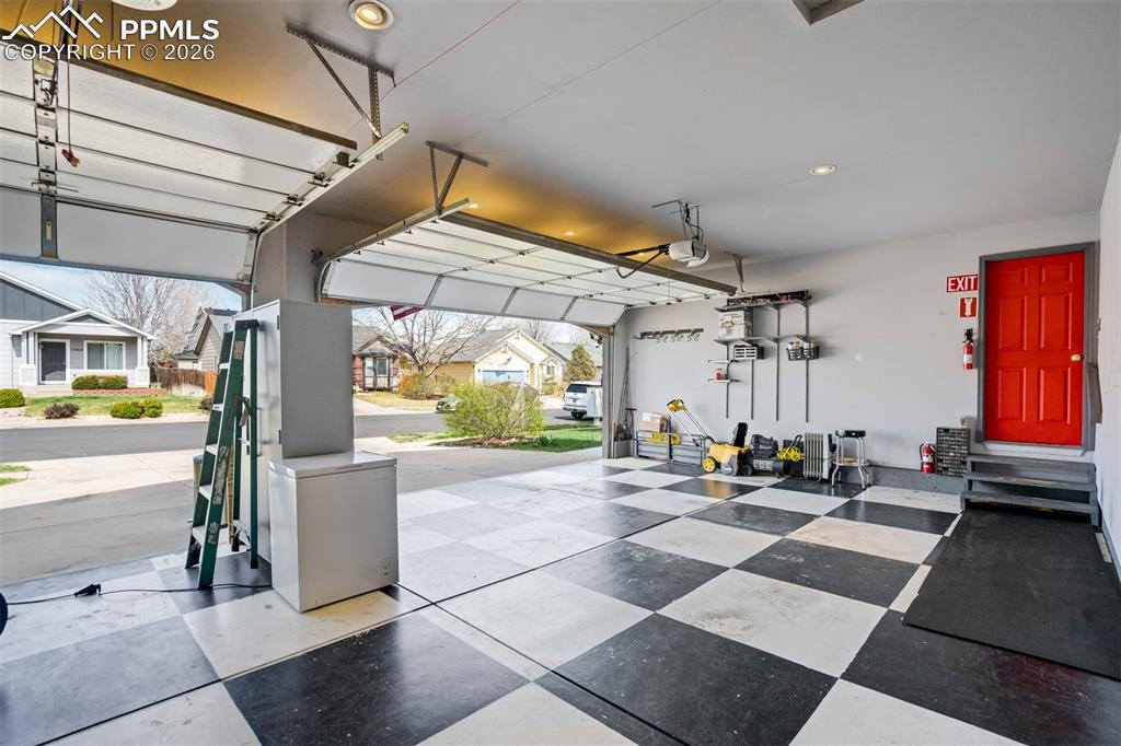 Image 43 of 50: The oversized three-car garage is a standout feature, offering abundant spa