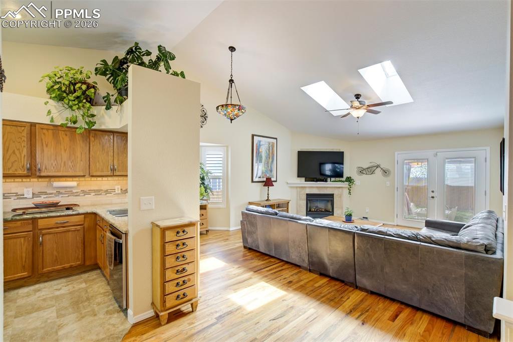 Image 5 of 50: The open-concept living and kitchen area is perfect for everyday living and