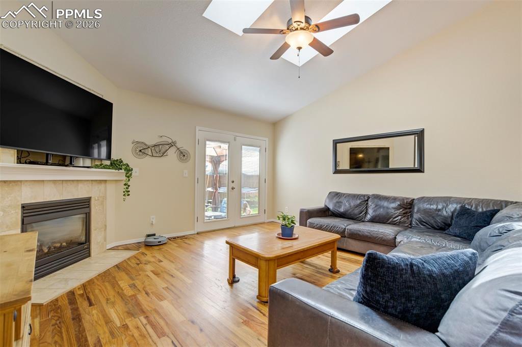 Image 8 of 50: Enjoy easy access to the backyard through sliding glass doors, blending ind