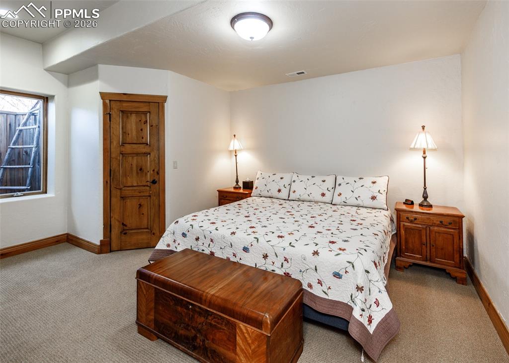 Image 28 of 49: Basement Bedroom