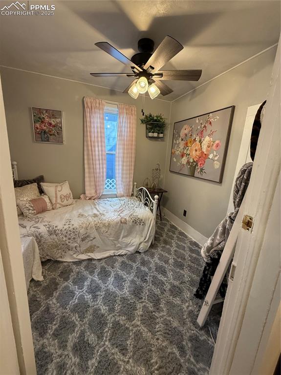 Image 11 of 19: Bedroom with carpet floors and ceiling fan