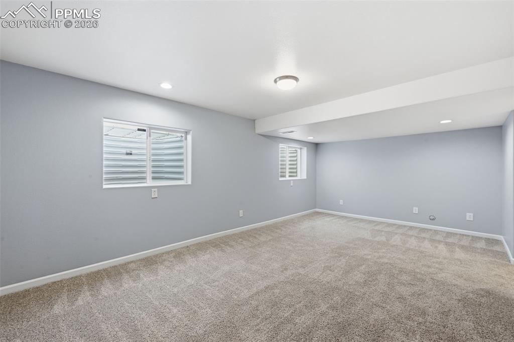 Image 26 of 42: Family room in basement