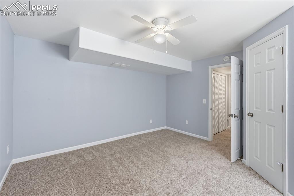 Image 31 of 42: 4th bedroom in basement recently redone