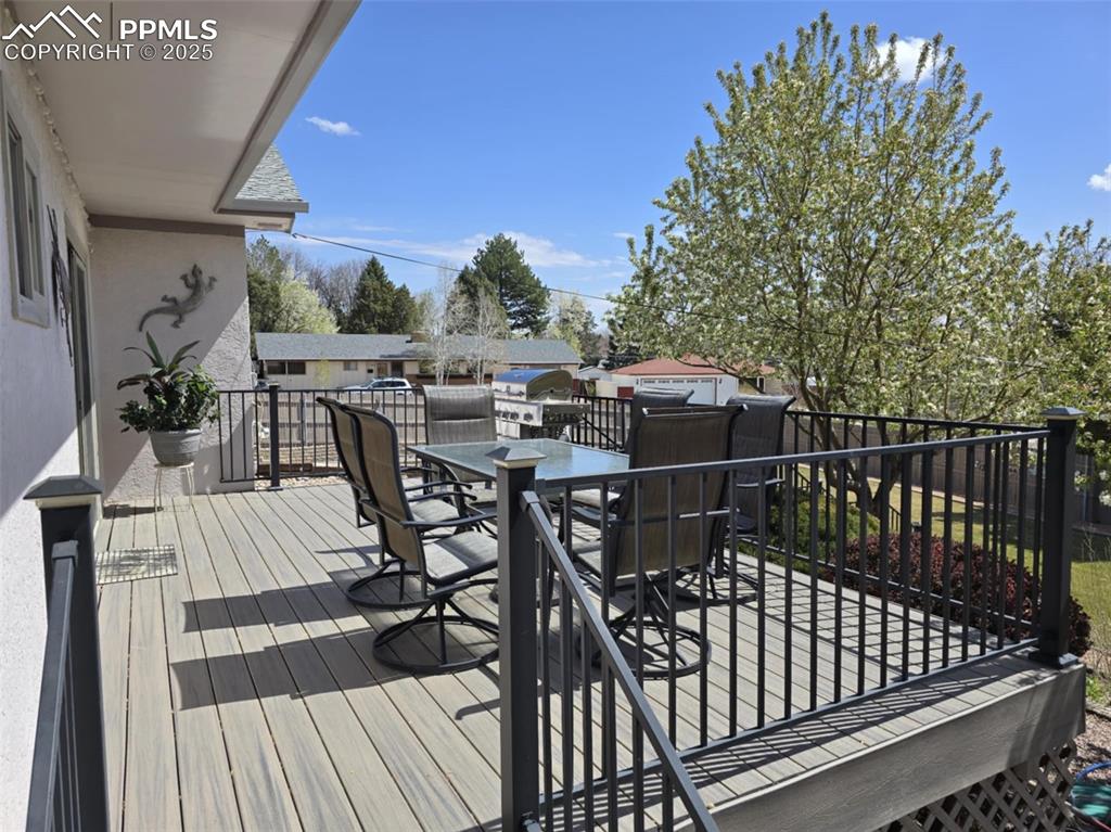 Image 29 of 41: Trex deck with outdoor dining space