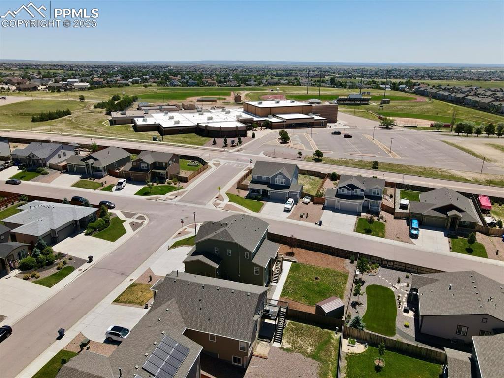Image 33 of 40: Aerial view of neighborhood/corner lot