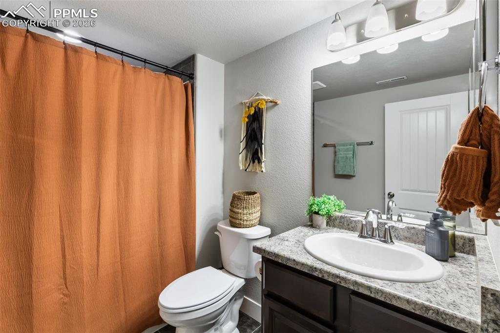 Image 30 of 41: Basement full bathroom