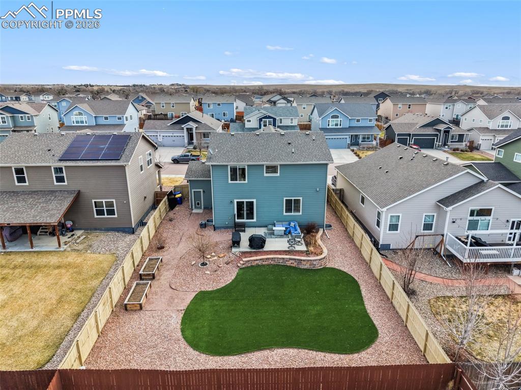 Image 39 of 41: Beautifully landscaped backyard