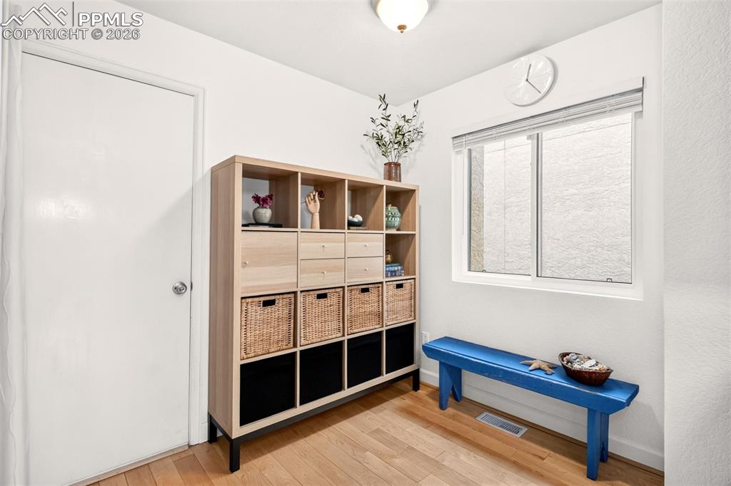 Image 12 of 32: 6x8 eating nook as you enter from the garage.