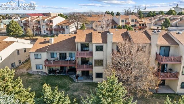 Image 2 of 36: Spring photo showcasing 2 trex decks and a concrete patio great for enterta