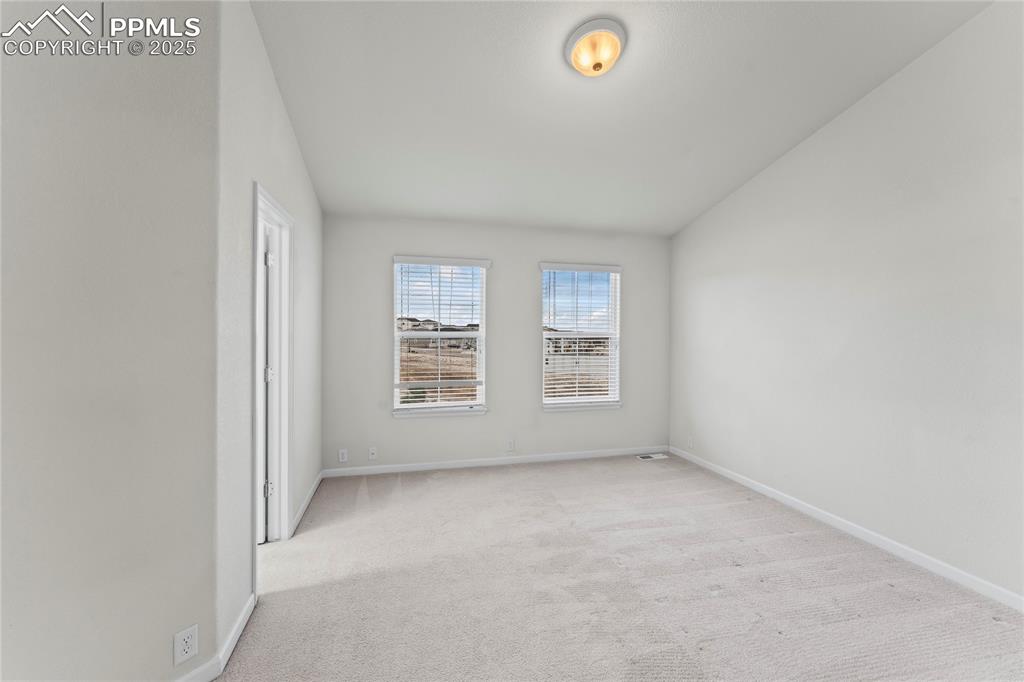 Image 16 of 26: Unfurnished room featuring light colored carpet and baseboards