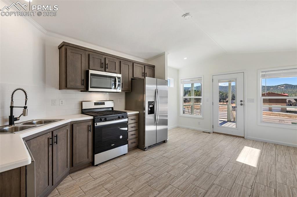 Image 8 of 23: Kitchen and Living Room