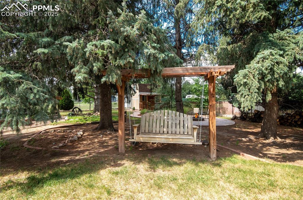 Image 33 of 42: View of yard with a shed