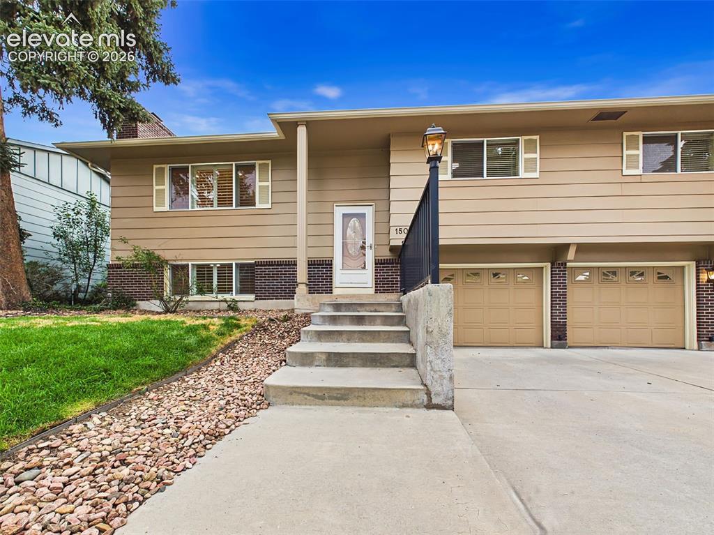 Image 2 of 50: Front Entry – Welcoming front entrance with a covered entryway, updated lig