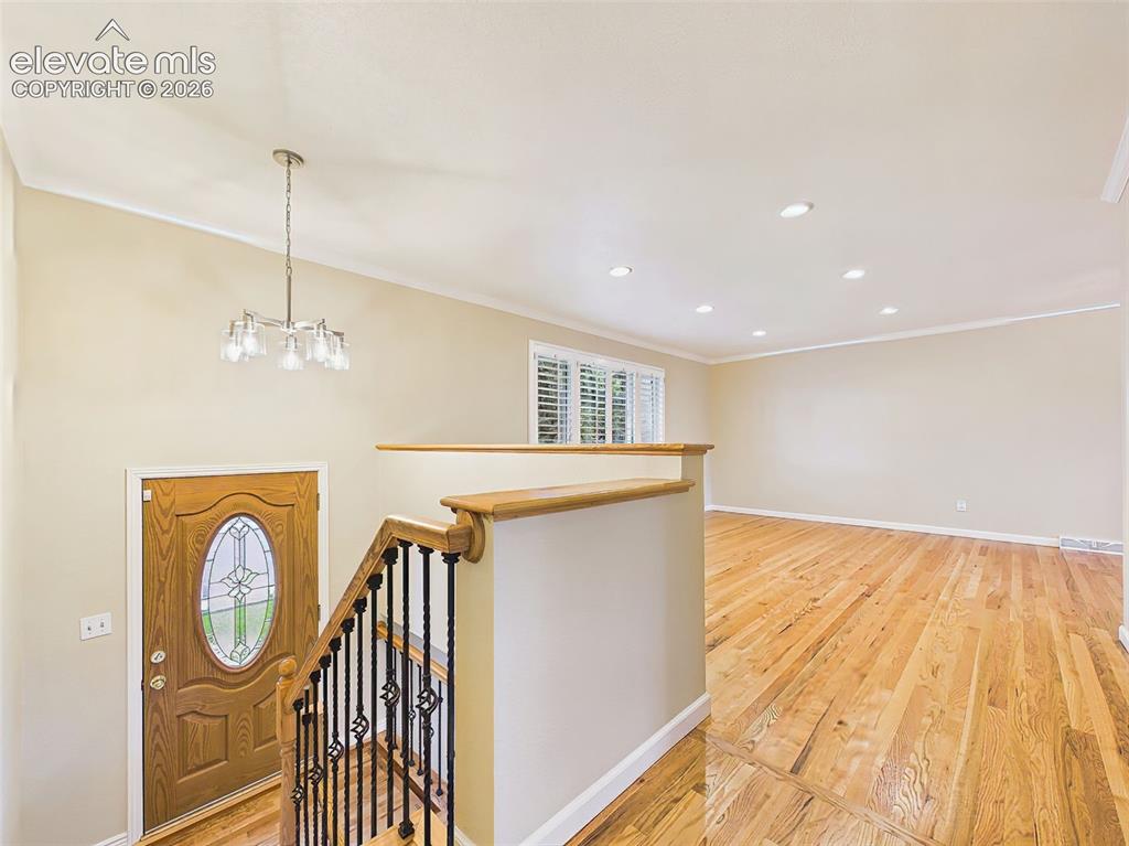 Image 3 of 50: Entry & Living Room – Bright, inviting entry opens to the main living area,