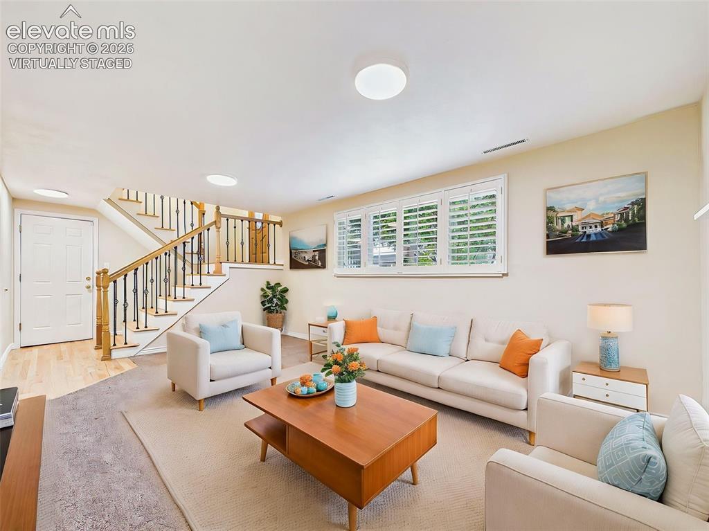Image 34 of 50: (Virtually Staged)Family Room – Alternate perspective showcases the seamles