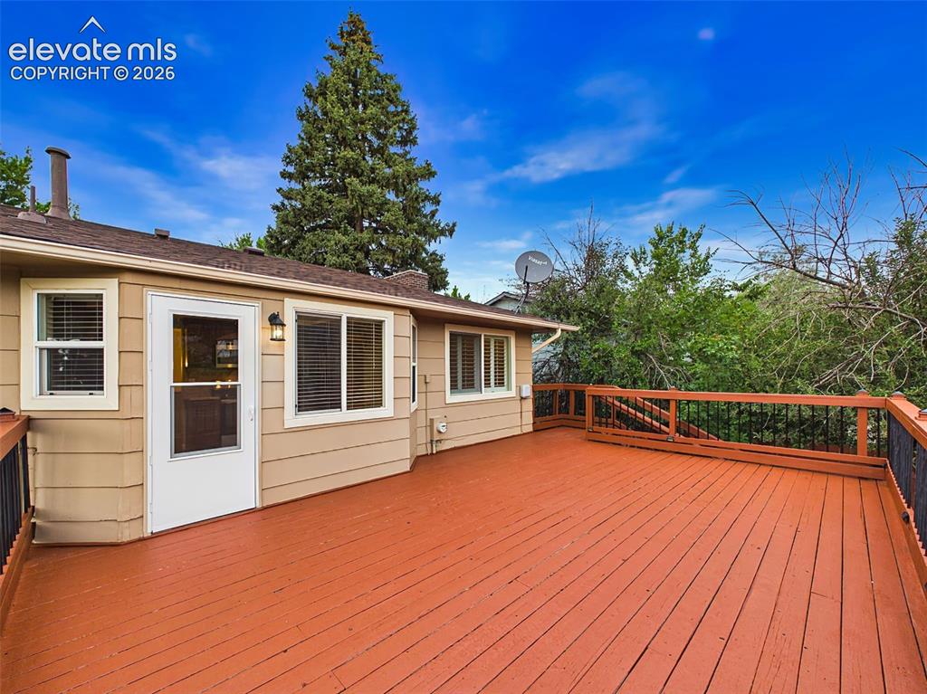 Image 46 of 50: Alternate view highlights the deck’s generous size, direct access from the 