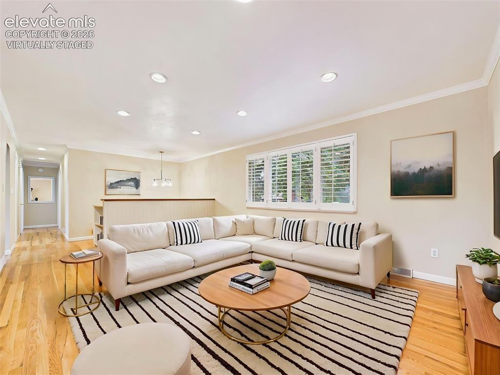 Image 6 of 50: (Virtually Staged) Living Room – The generous living room creates a comfort