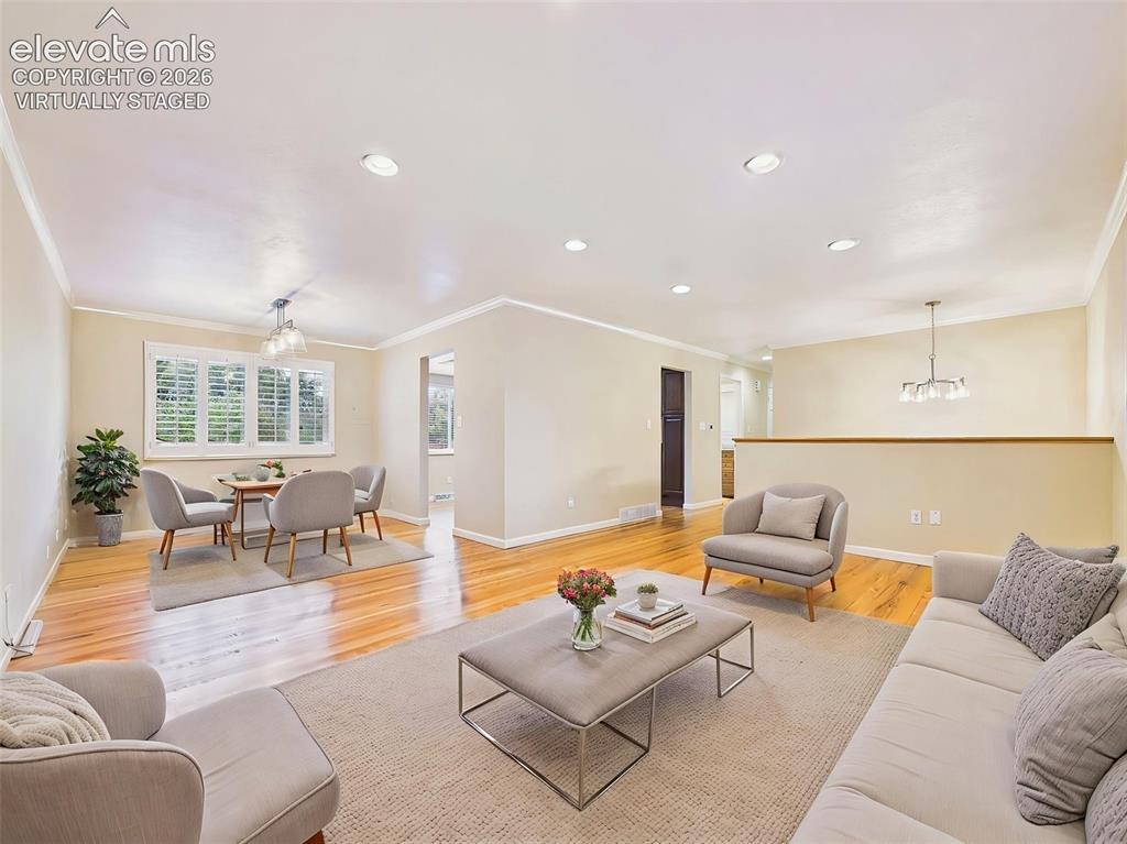 Image 8 of 50: (Virtually Staged) Living & Dining Areas – Open-concept living and dining s