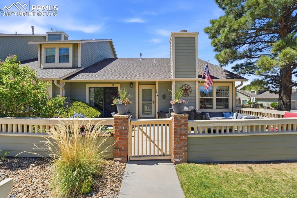 Image 3 of 41: Single-level façade (left side dormer windows are the adjacent property), a