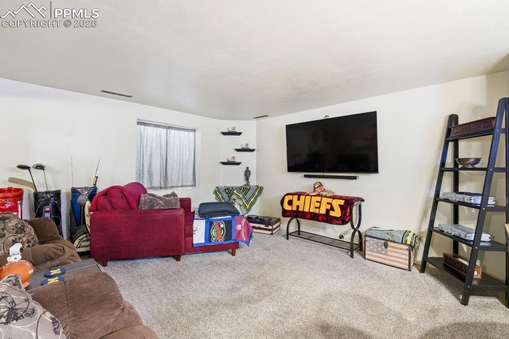 Image 31 of 41: Lower level family room 