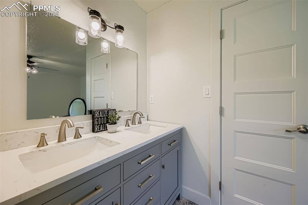 Image 23 of 37: Primary Bathroom with double vanity!