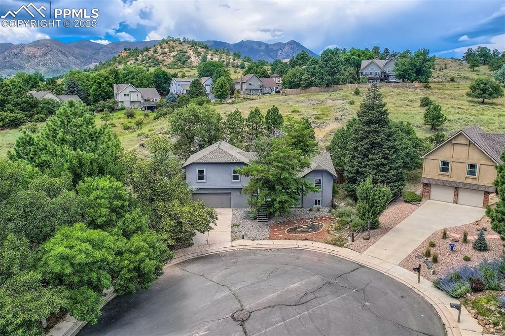 Image 8 of 37: Peacefully perched in a quiet culdesac with open space to the rear, peacefu