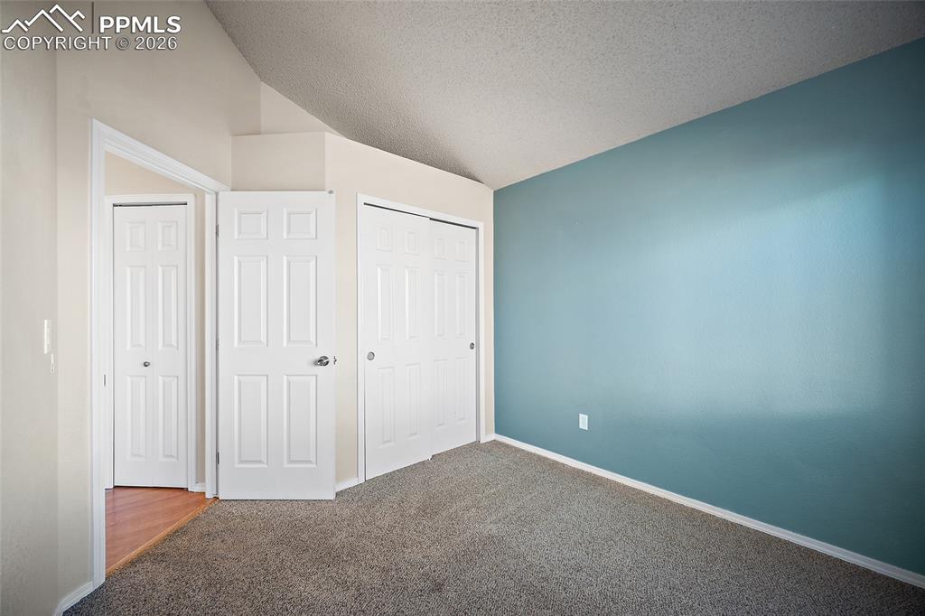 Image 23 of 38: Bedroom