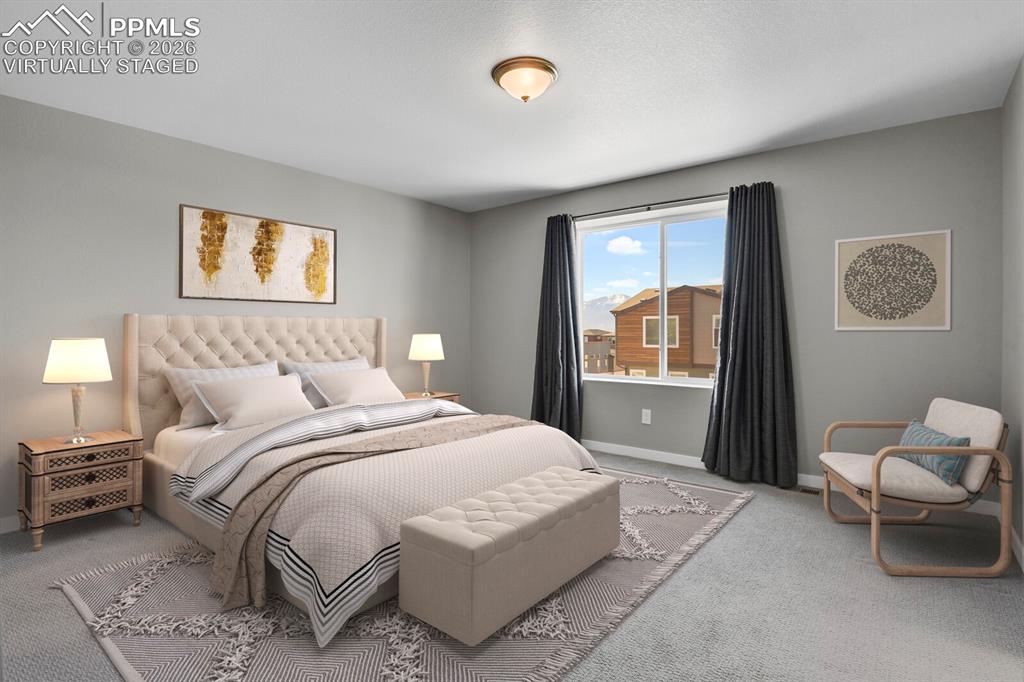 Image 17 of 40: Virtually staged photo , Primary bedroom with window facing West