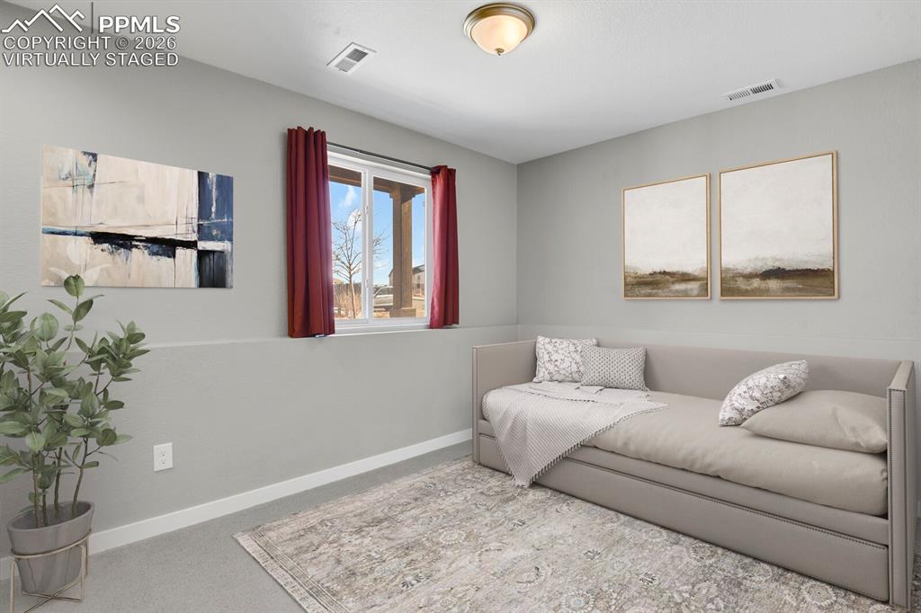 Image 26 of 40: Virtually staged Photo , flex space that can be used as a 3rd bedroom , off