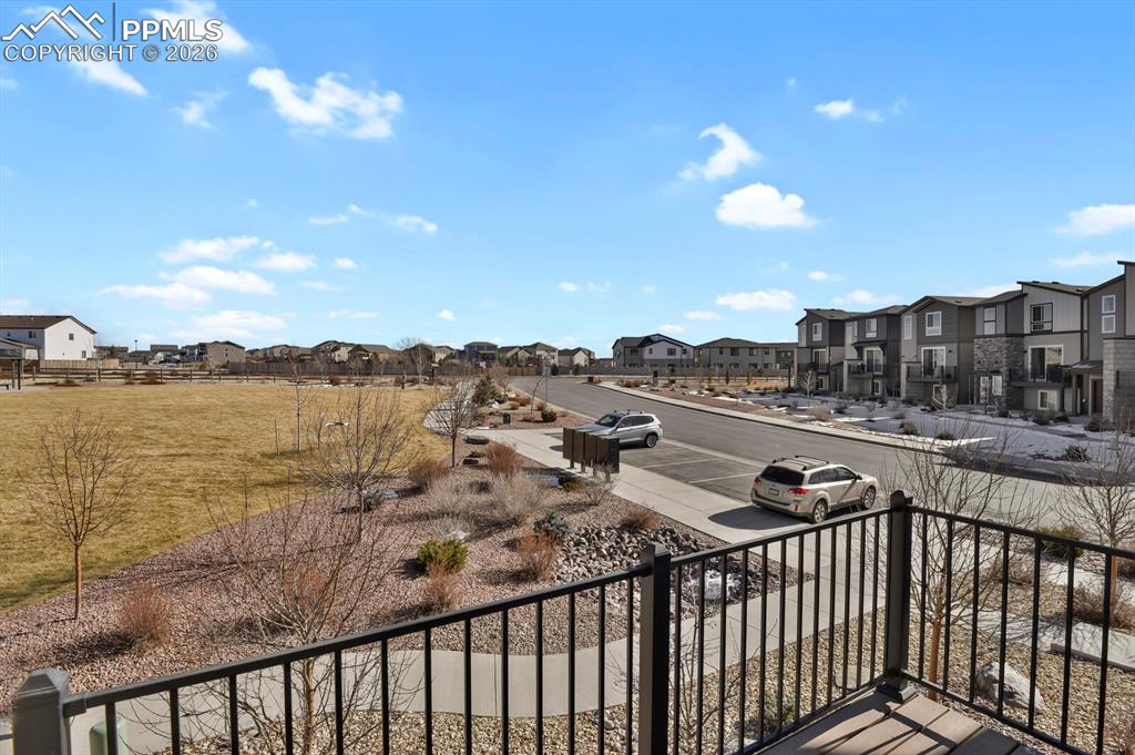 Image 33 of 40: Front Balcony Facing east for your morning coffee with the sunrise