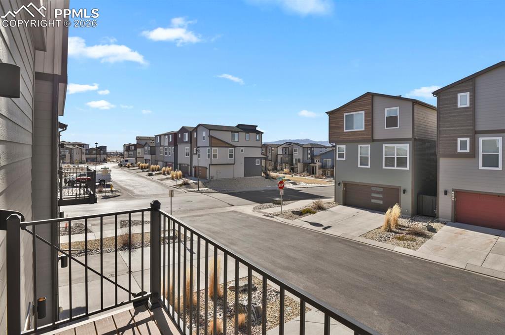 Image 34 of 40: Balcony with a residential view