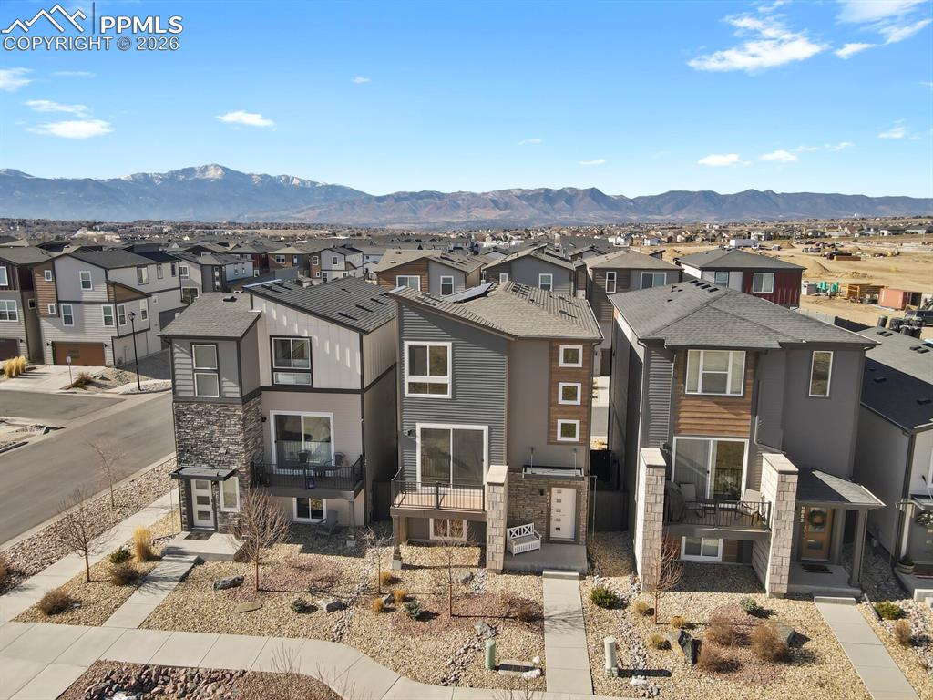 Image 37 of 40: View of front of house with a residential view, a mountain view.