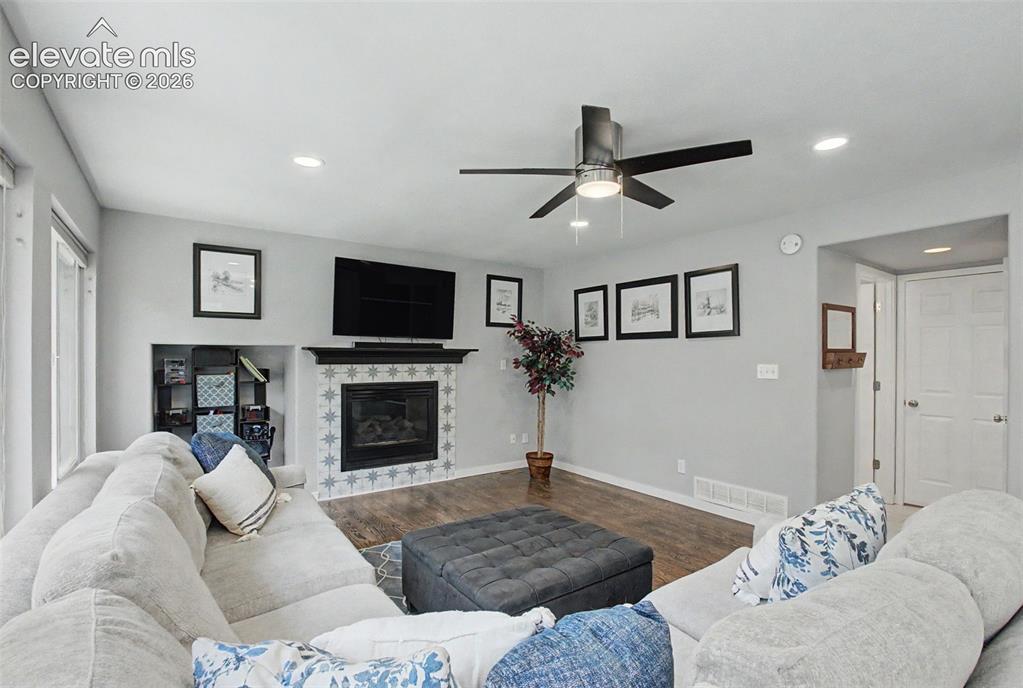 Image 12 of 50: The cozy fireplace in the living room is a perfect
gathering place