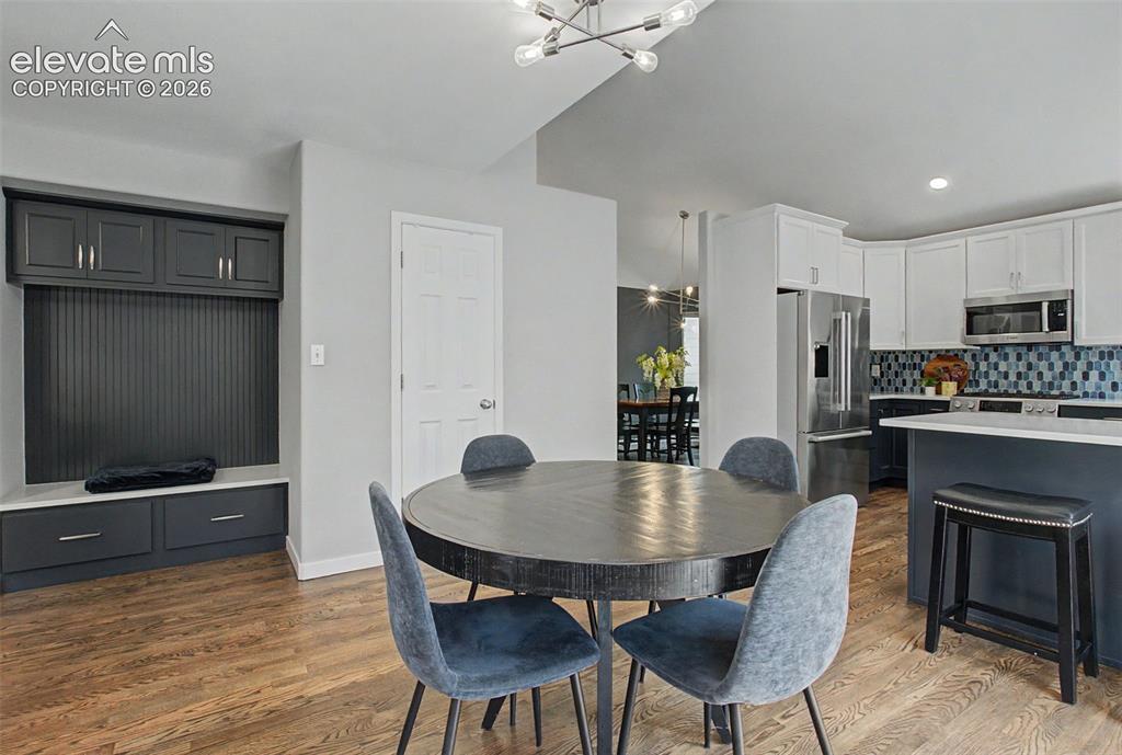 Image 16 of 50: Spacious eating nook located off kitchen island
which also offers counter 