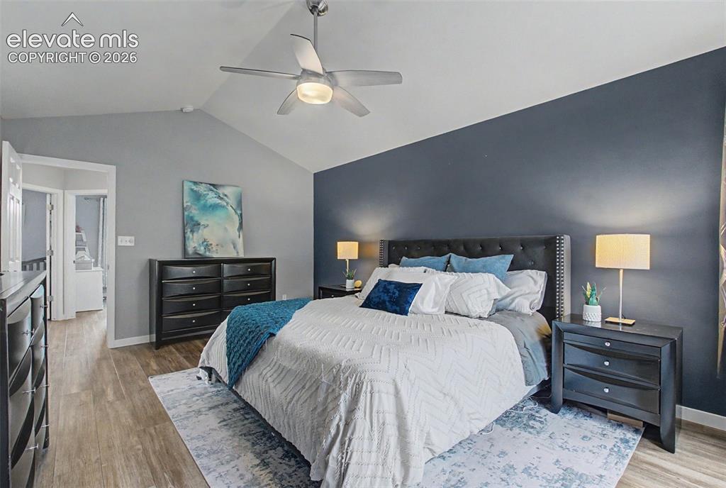 Image 19 of 50: Spacious Primary Bedroom with vaulted ceilings is
a perfect retreat