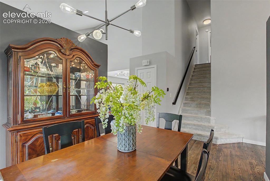 Image 8 of 50: Updated light fixture in dining room