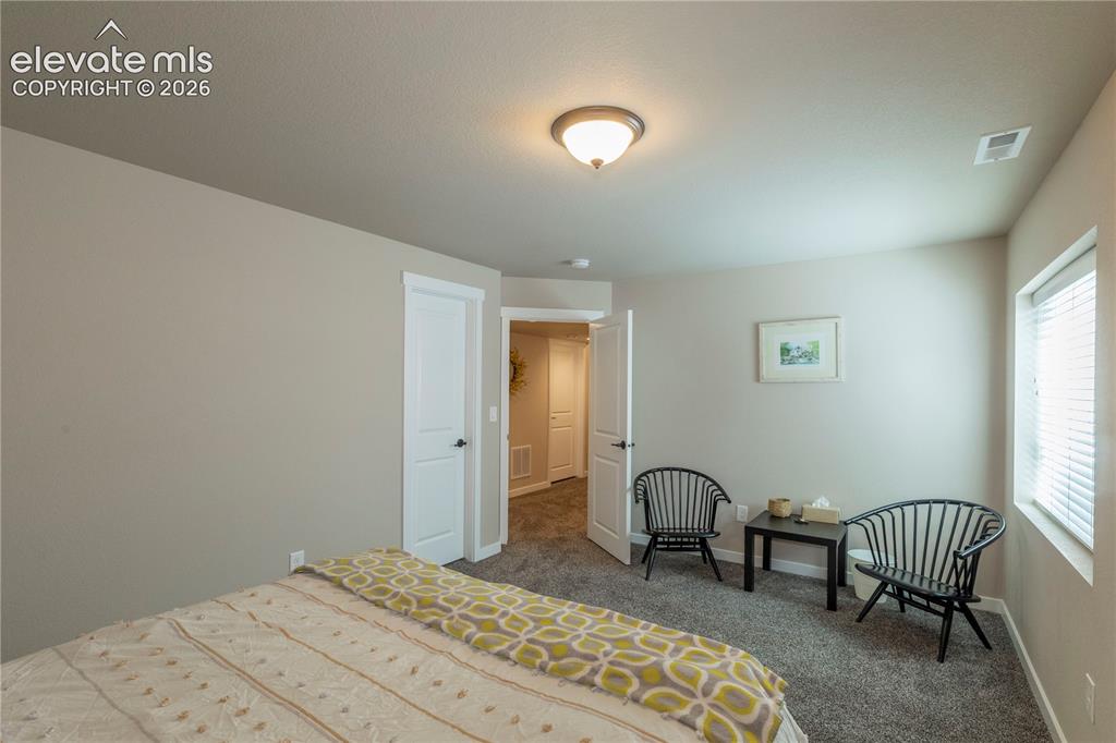 Image 20 of 32: Sitting Area in one of the Bedrooms