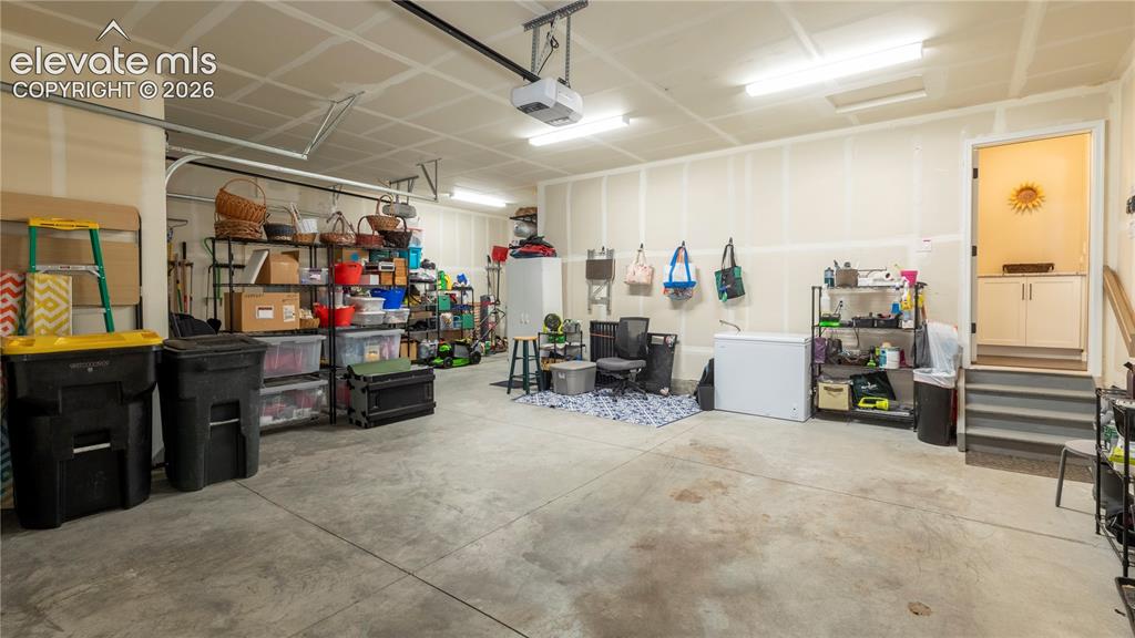 Image 26 of 32: Huge garage can fit Everything!