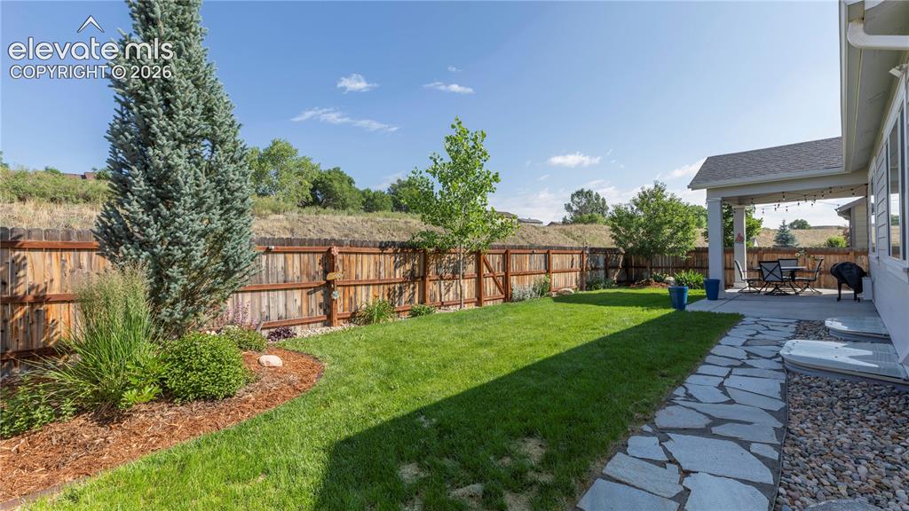 Image 29 of 32: Beautiful Landscaping front and back