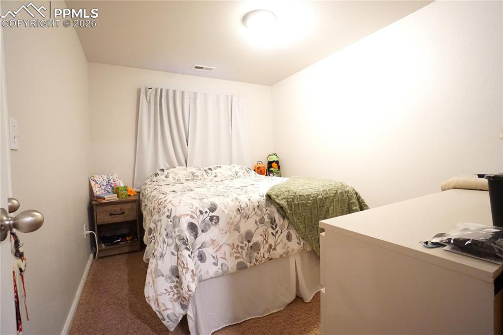 Image 26 of 33: Bedroom