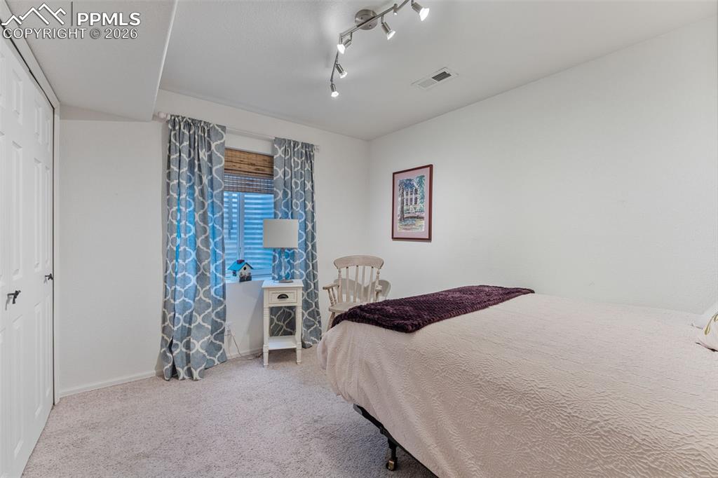 Image 23 of 36: Bedroom