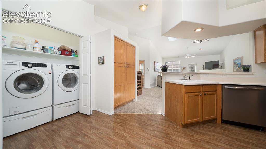Image 10 of 32: Kitchen + laundry