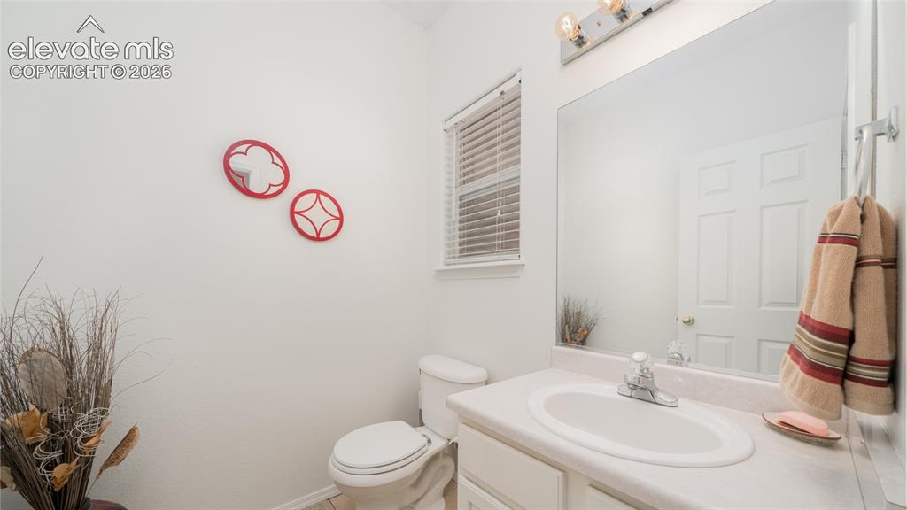 Image 19 of 32: Main level powder room