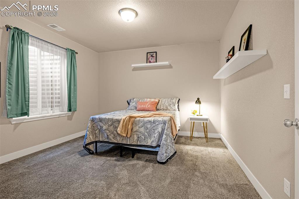 Image 37 of 49: Bedroom