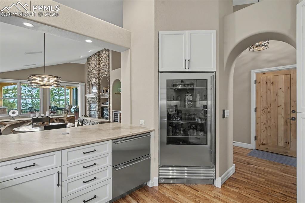 Image 10 of 45: Entertaining is effortless with premium integrated features, including a bu