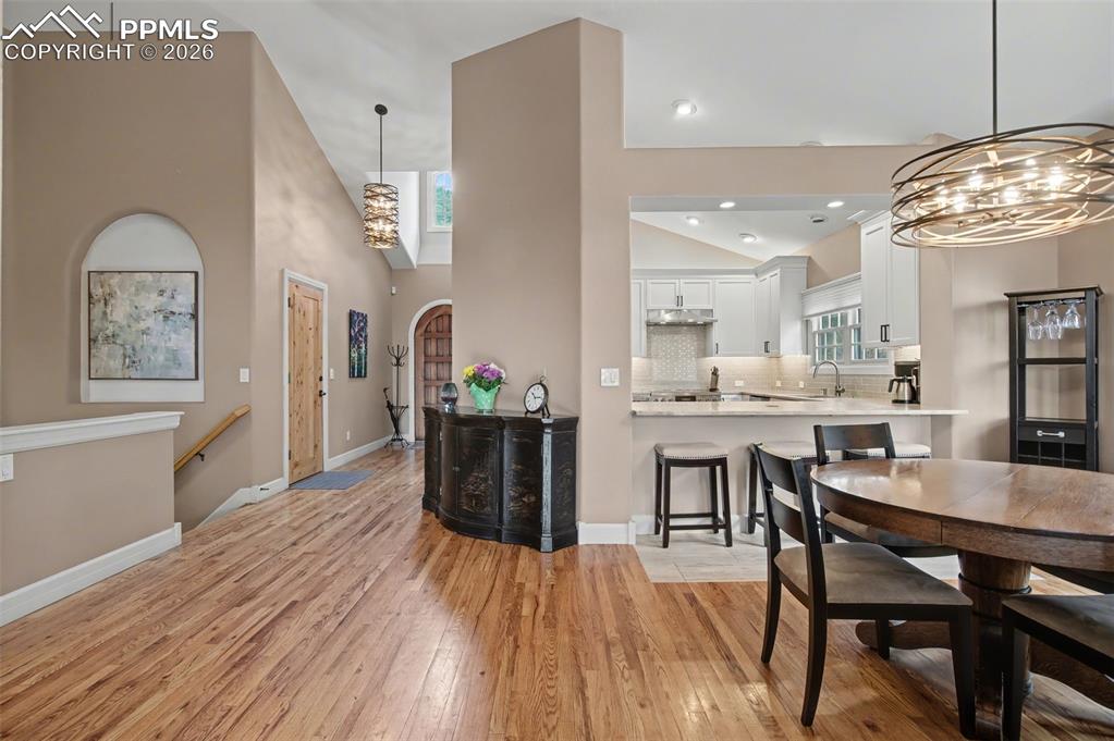 Image 11 of 45: The professionally updated interior welcomes you with an airy, open flow, s